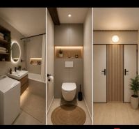Bathroom with a bathtub and mirror, modern toilet, and entrance door in a 2-room apartment.