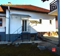 The courtyard of a family house on Letecká Street in Spišská Nová Ves with a concrete staircase.