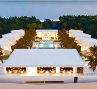 Luxury resort buildings with a pool and palm trees in Matemwe, Unguja North East, commercial land.