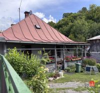 A family house on Laskomerska Street in Banska Bystrica with a simple garden and terrace.