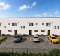 A family house in Nová Polhora on Nová Polhora Street with a parking lot and a children's playground.