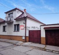 A family house on Sadova Street in Piešťany with a garage and a small balcony.