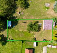 A cottage on Dubková Street in Lazy pod Makytou with a large grassy plot and trees.