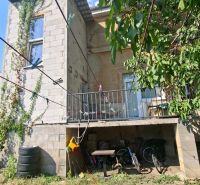 A family house on Levická Street in Vráble with a veranda and a garden.