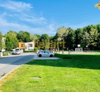 A peaceful area with greenery and a playground on Žltá Street in Bratislava - Petržalka.