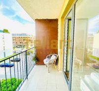 Balcony of a 1-room apartment on Žltá Street, Bratislava - Petržalka, with seating and a view.