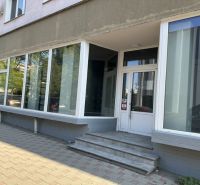 Offices on Ľudovíta Štúra Street, Lučenec, with large glass display windows.