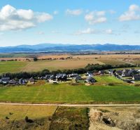 View of the plots - housing in Mlynica with surroundings and forests on the horizon.