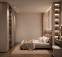 Bedroom with a bed and wooden decor flooring in a holiday apartment.