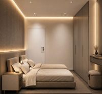Bedroom in a holiday apartment with a double bed, built-in wardrobes, and soft lighting.