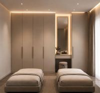 Recreational apartment room with large wardrobes, two beds, and elegant lighting.