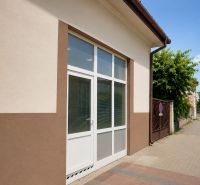 Commercial premises on Fučíkova Street in Sládkovičovo with glass doors.