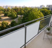 The balcony of a 2-room apartment in Bratislava - Ružinov on Sputniková Street, with a view of greenery.