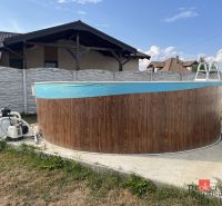 Family house on SNP Street in Čaňa with a pool in the yard.