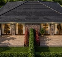 A family house in Dunajský Klátov with a spacious terrace surrounded by greenery. Residential plots.