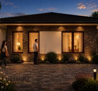 A family house illuminated in the evening light in Dunajský Klátov, Residential plots.