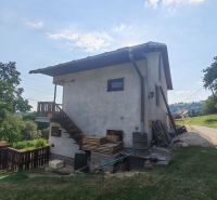 Family house at Pivnička 430 in Hriňová, with a wooden staircase and garden space.