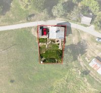 Aerial view of a family house in Hriňová at Pivnička 430 with a yard.