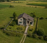 A family house in Kazimír on Biela Street surrounded by a green plot and garden.