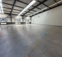 Warehouses and halls with high ceilings and large windows, suitable for various purposes.