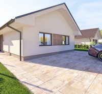 A family house in Tuchyňa on Tuchyňa Street with a terrace and parking on a paved area.