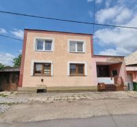 A family house on Šípošova Street in Šahy with a two-story facade and a garage.