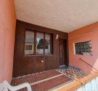Entrance to the family house on Šípošova Street in Šahy with ceramic tiles.