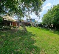 The garden at the family house on Šípošova Street in Šahy with clotheslines.