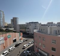 View from Kresánkova Street in Bratislava - Karlova Ves with surroundings and cars on the street.