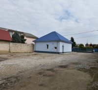 Commercial premises on Dlhoveská Street in Šaľa, with a building and a spacious courtyard.
