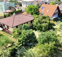 A family house on Severna Street in Kláštor pod Znievom surrounded by greenery and trees.