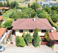 A family house on Severna Street in Kláštor pod Znievom surrounded by greenery and a yard.