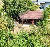 A family house on Severna Street in Kláštor pod Znievom surrounded by a garden and trees.