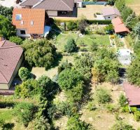 Family houses with gardens on Severna Street in Kláštor pod Znievom, surrounded by greenery.