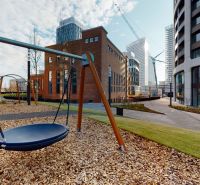 On Čulenova Street, there is a modern playground surrounded by architecture and a 2-room apartment.