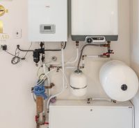 Boiler and connections in a family house determine the heating and water supply system.