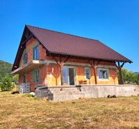 A family house in Prestavlky with an incomplete facade and a beautiful view of nature.