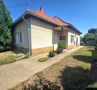 A family house on Murgašova Street in Šaľa with a landscaped garden and a balcony.