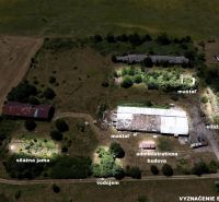 Aerial view of unusual properties in Stará Turá with agricultural buildings.