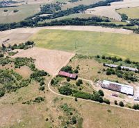 Aerial view of unusual properties around Stará Turá, surrounded by fields and greenery.