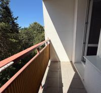 A balcony with a view of greenery in a 3-room apartment on Tulská Street, Banská Bystrica.