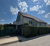 A family house on Tešmak Street in Šahy with a fence and a paved walkway.