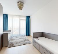 Children's room with a bed, wardrobe, and luxurious chandelier in a 4-room apartment.