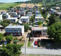 Aerial view of a residential area in Kráľovce with a family house on Kráľovce Street.