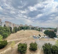 Park with a playground and apartment buildings on Družicová Street, Košice - Nad jazerom district.