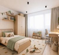 Children's room in a 3-room apartment with furniture made of natural materials and toys.