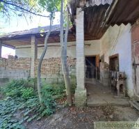 An old building surrounded by greenery in Nová Vieska suitable for residential land.