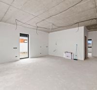 The interior of a family house with neutral walls and preparation for electrical installation.
