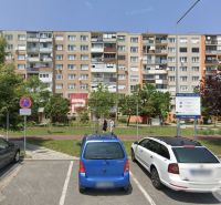 Parking lot in front of the apartment building on Sokolská Street in Senec.