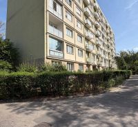 An apartment building surrounded by greenery on Šándorova Street in Bratislava - Ružinov.